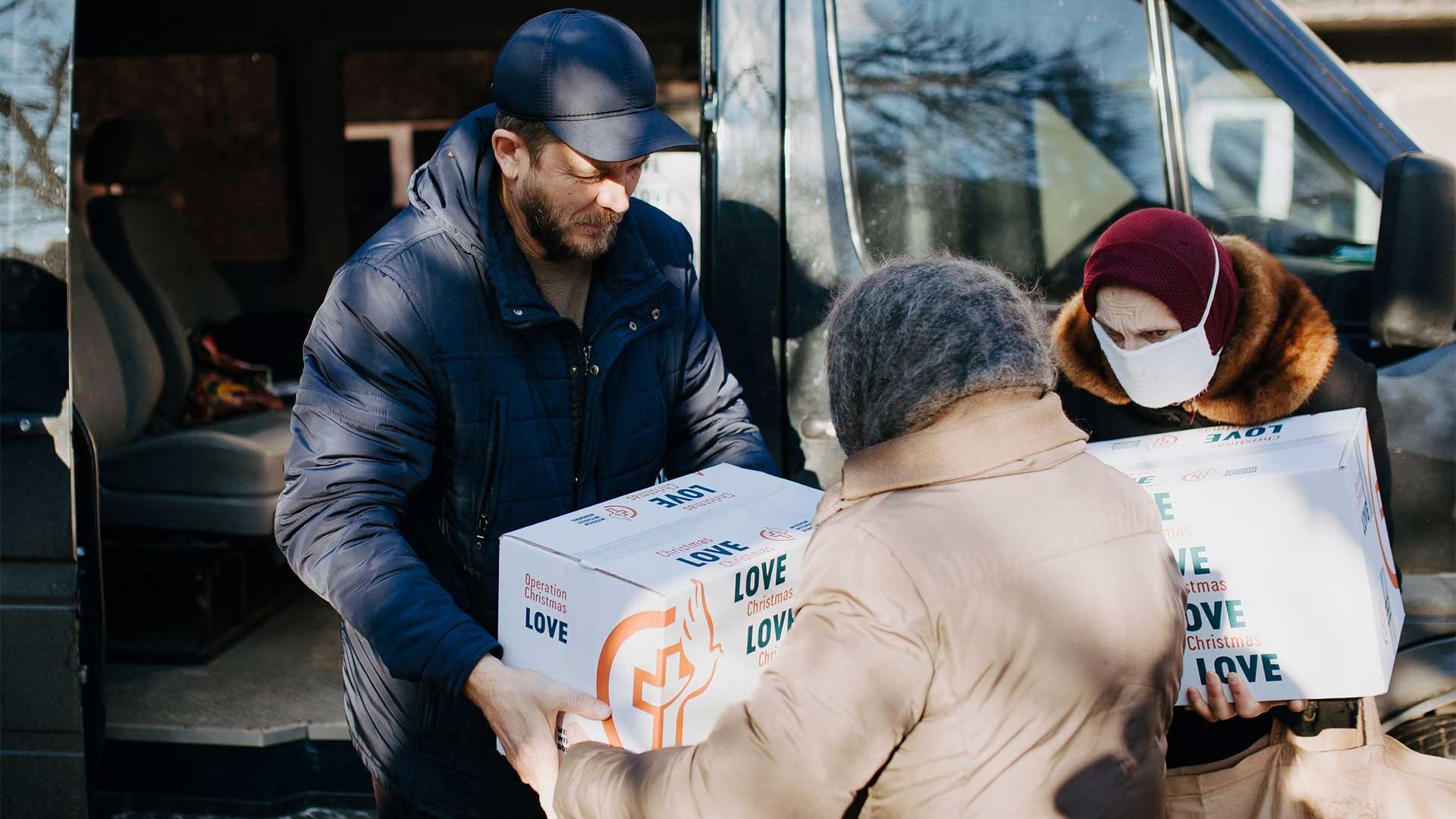 Delivering parcels to the needy.